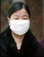 Chinese woman protects herself against epidemic.